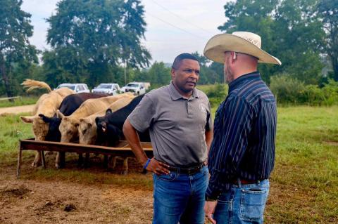 Don Davis with Cattle Farmers 